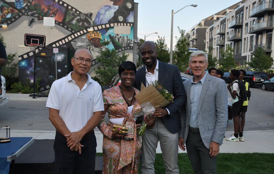 Leslie Nymark tenant representative and community animator Nicole Marcano receives her scholarship from Don Valley North MPP Vincent Ke, Tridel Director of Development and Planning, Bryan Sherwood and TCHC Interim President and CEO Tom Hunter.