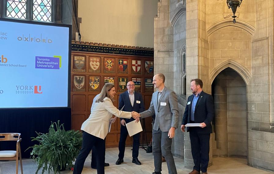 A person receiving a certificate
