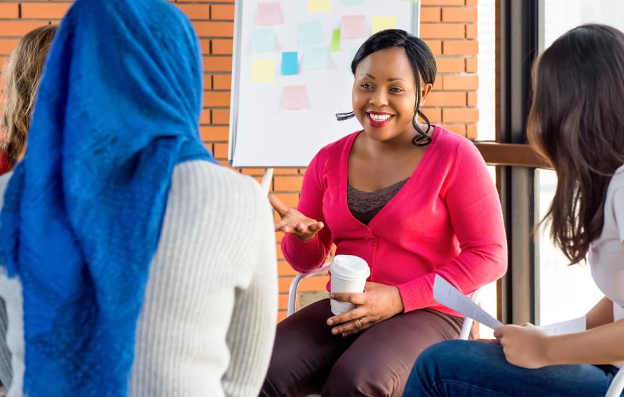 A group sitting to discuss something