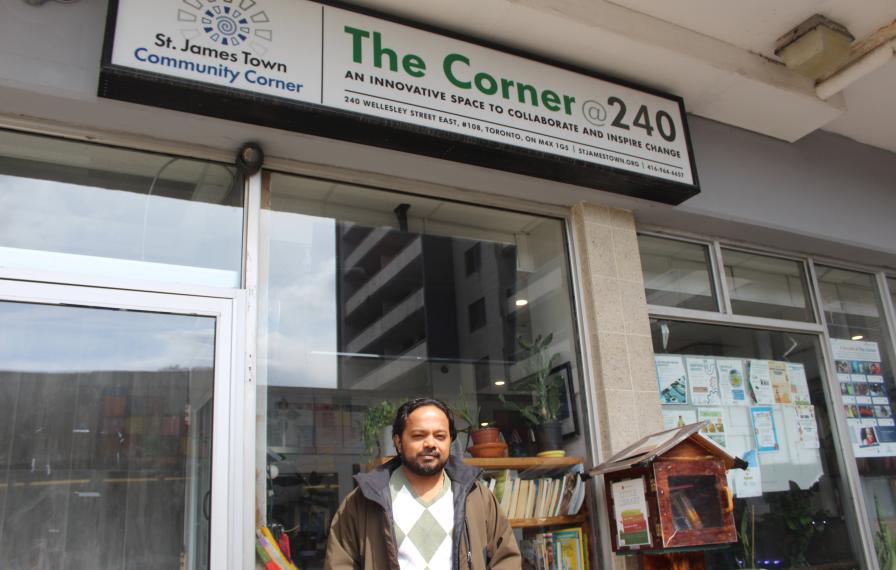 Aravind Joseph in front of the St.James Town community corner