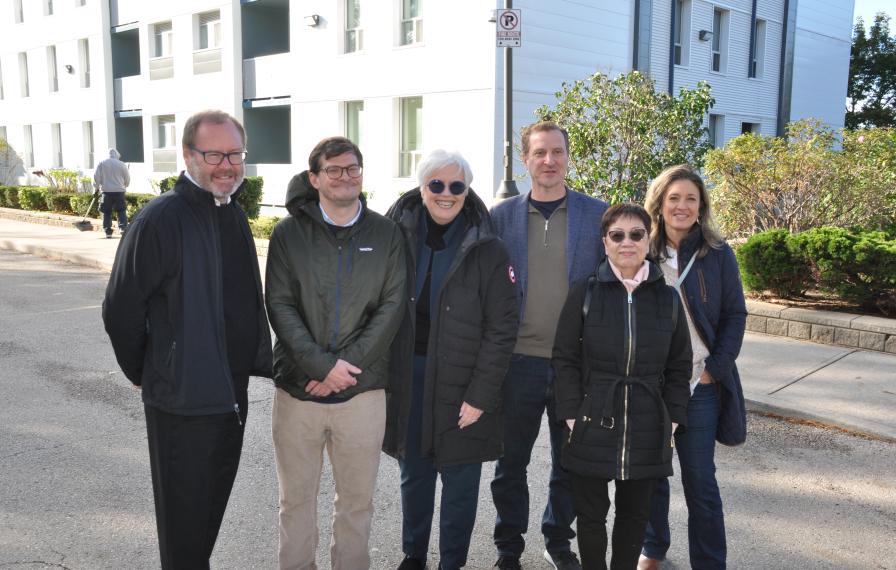 TCHC staff in front of 2 Brahms Avenue in North York
