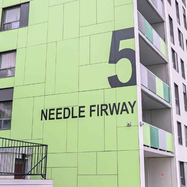 Side view of 5 Needle Firway apartment building.
