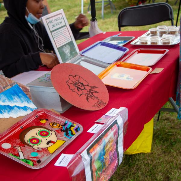 Local resident and entrepreneur, Makila Jackson, displays her work at this year’s TCHC community festival.