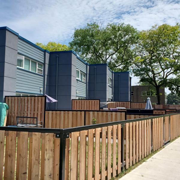 Backyard view of one of the newly rehabilitated family units at 410 McCowan. 