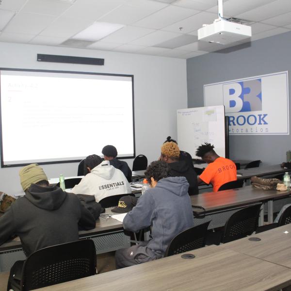 TCHC youth attending a seminar as part of Brook Restoration Pre-Apprenticeship program