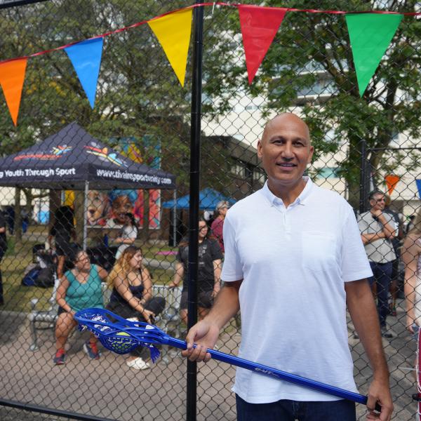 Mohsin Khattak with the lacrosse stick