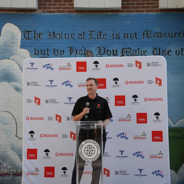 Sean Baird, CEO and president of TCHC speaking at the inauguration of Aleax park Basketball court