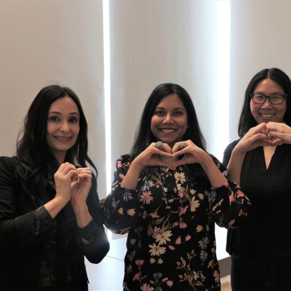 TCHC employees strike the #inspireinclusion pose in support of the 2024 International Women's Day campaign.