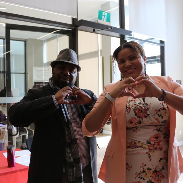 TCHC employee striking the #inspireinclusion pose in support of the 2024 International Women's Day campaign.