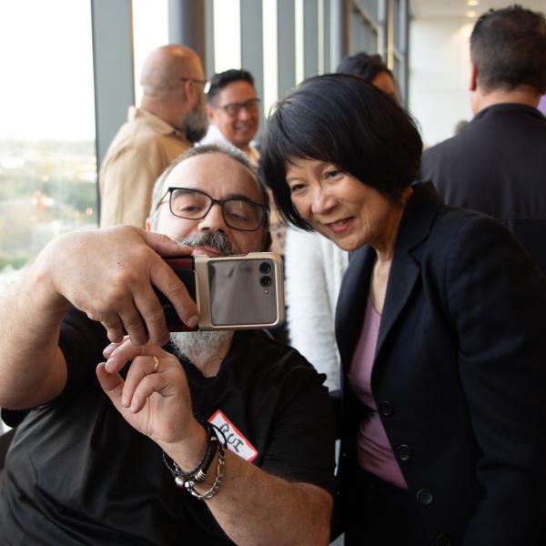 Mayor Olivia Chow engaging with tenants and taking pictures after the East region TCAT
