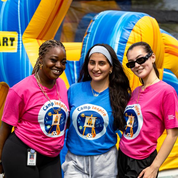 Camp Inspire leaders in pink and blue shirts