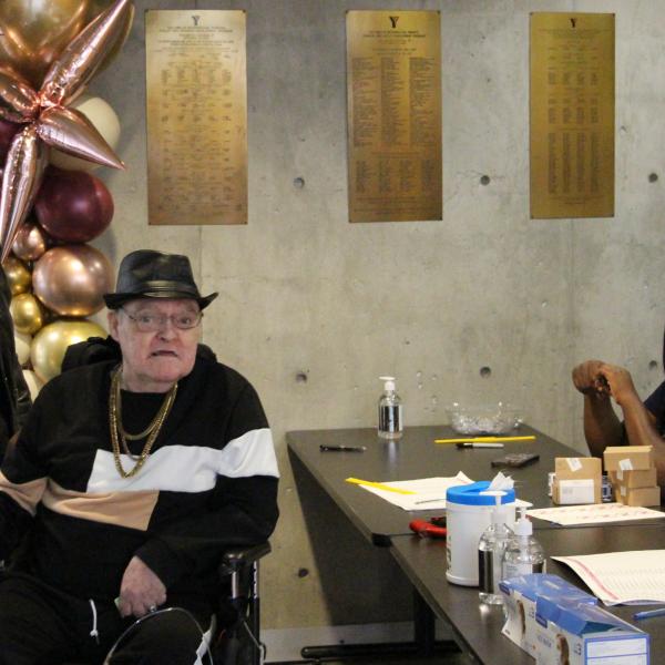 Styling tenants are joyfully welcomed at the registration desk. 