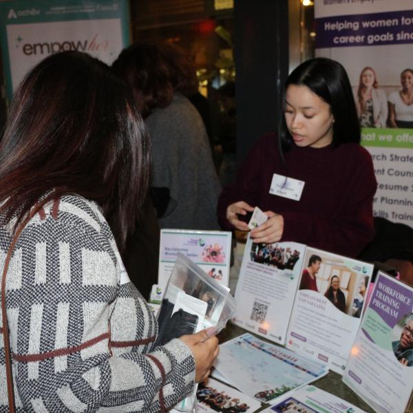 Someone visiting one of the marketplace booths at an IAM event