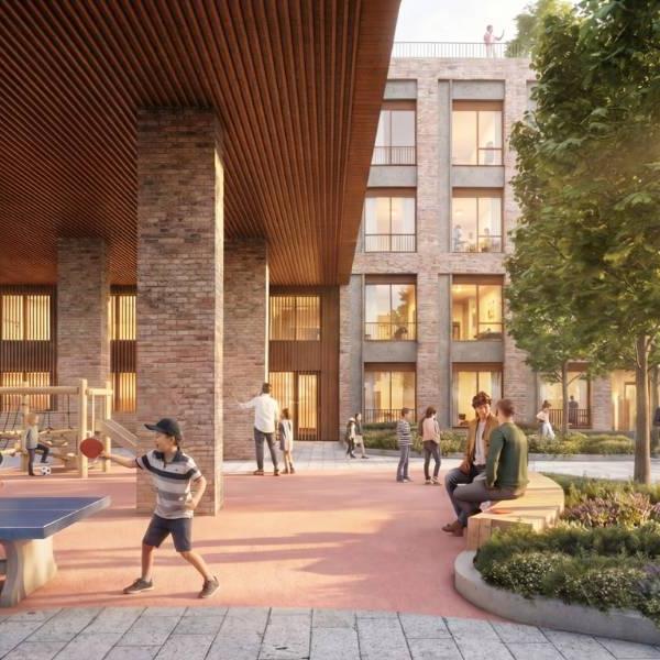 Rendering of a small courtyard beneath a building with a large overhang and another building in the background.