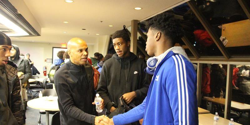 Man and tenant youth shaking hands