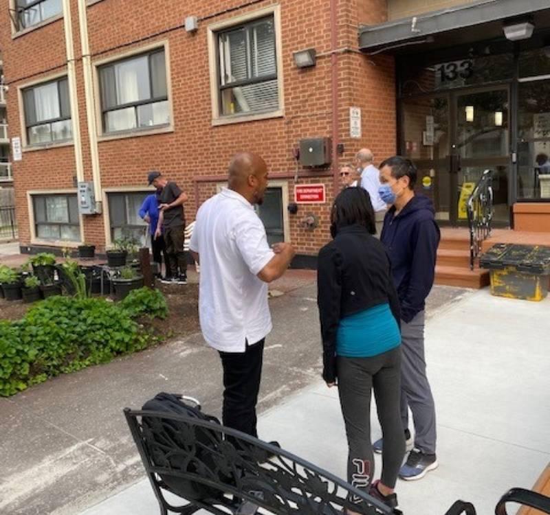 Tenants and TCHC staff discuss plans for the outdoor community gathering space at 133 Broadway Avenue