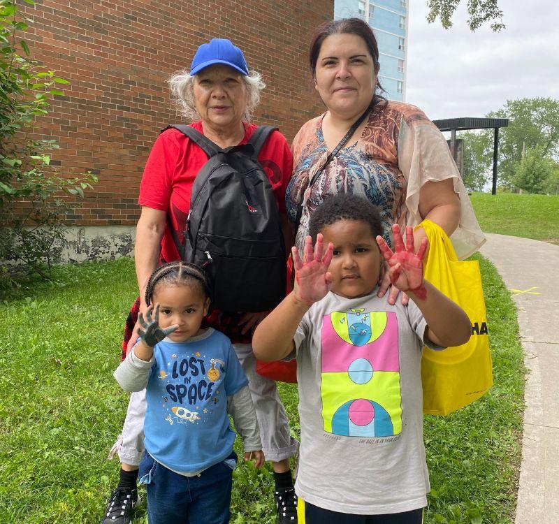 backpack-story-gordonridge-1 Georgina Baker (L) and Crystal Lizotte (R) with their children at the Gordonridge Community back-to-school giveaway event.
