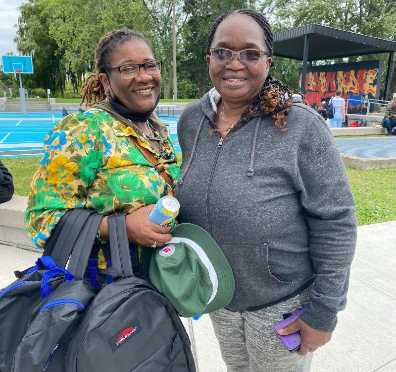backpack-story-gordonridge-2 Charmaine Charles (L) and Curdella Morgan at the Gordonridge Community back-to-school giveaway event