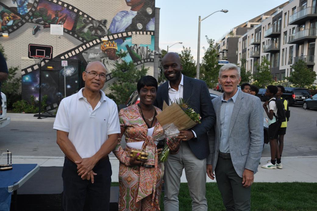 Leslie Nymark tenant representative and community animator Nicole Marcano receives her scholarship from Don Valley North MPP Vincent Ke, Tridel Director of Development and Planning, Bryan Sherwood and TCHC Interim President and CEO Tom Hunter. 