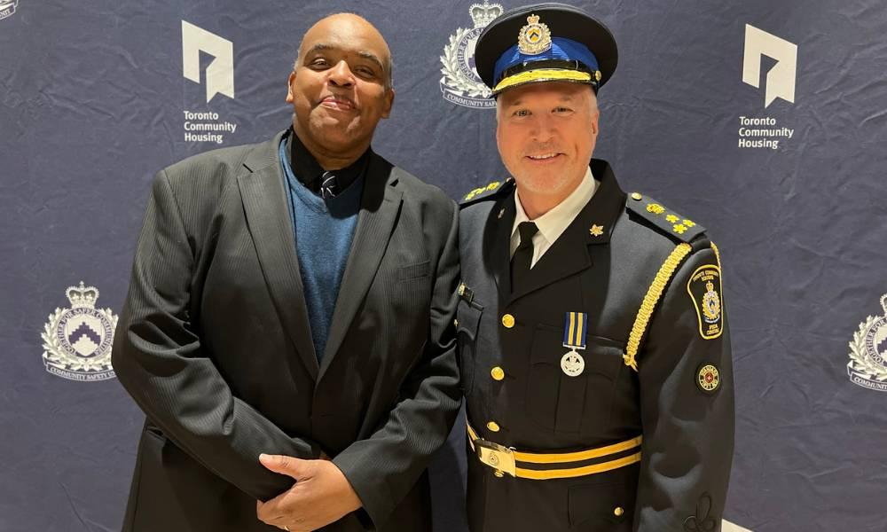 Special Constable Larry Shand and a CSU Special Constable posing for a photo.