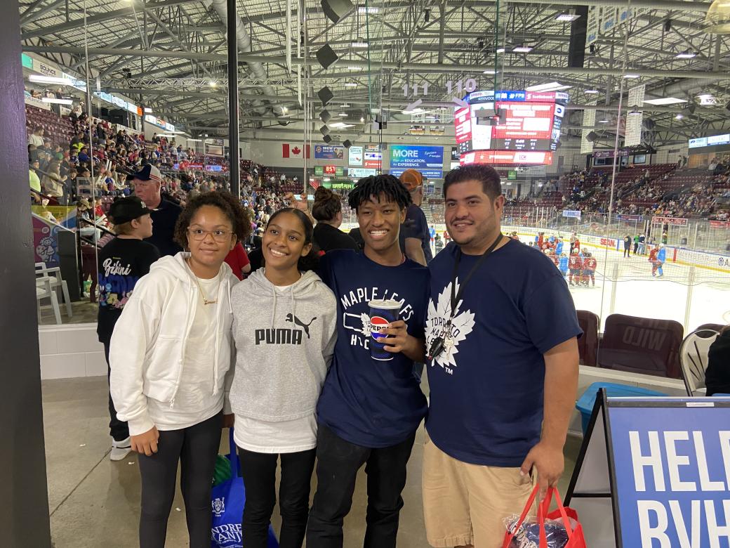 From left to right: Janessa Cole, Gabrielle Reyes, Lucas Reyes, and Joshua Reyes at the 2024 Boots and Hearts Barn Burner charity hockey game.