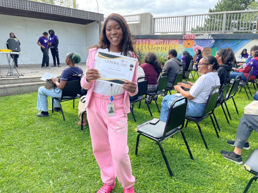 Deborah received a certificate for her contribution to the 37 Kids program.