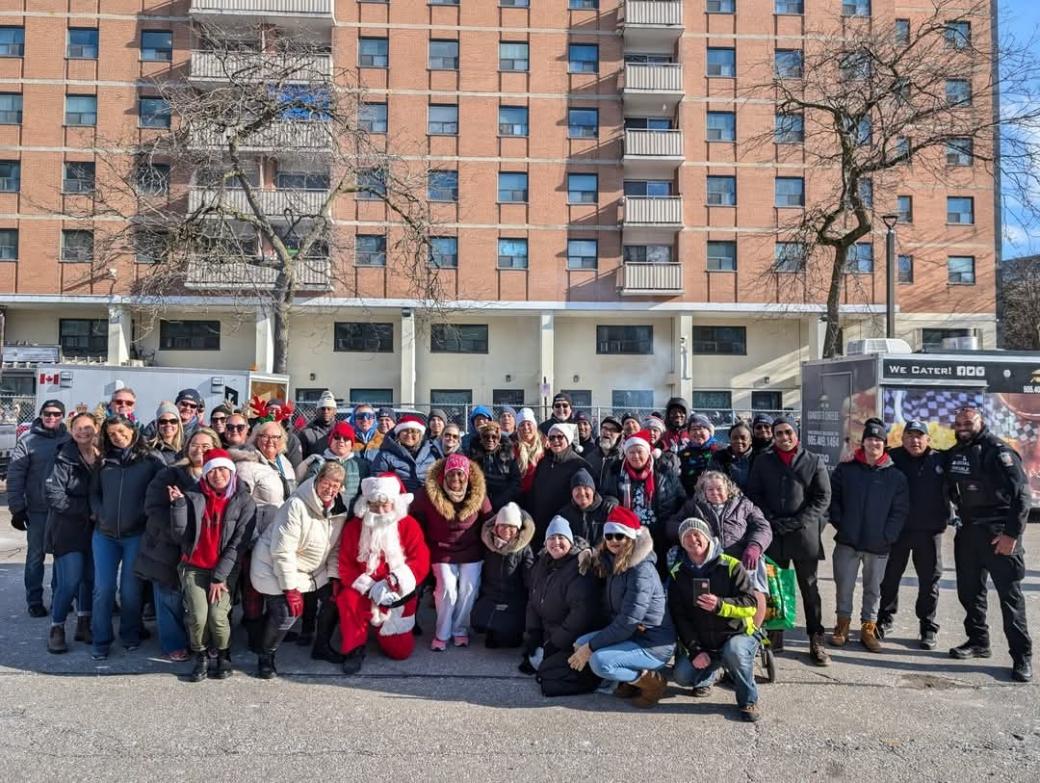 CSU staff and tenants pose for a holiday group picture 