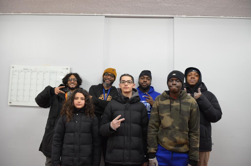 A group of people posing for the camera