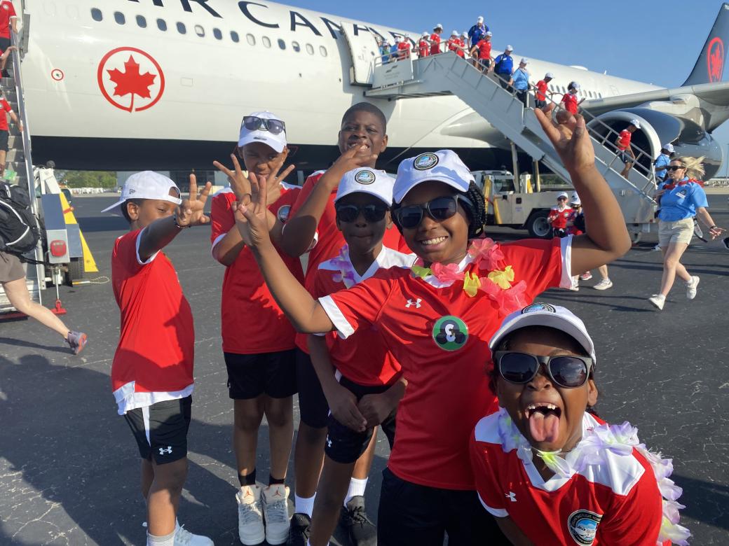 dreams take flight participants getting on a plane