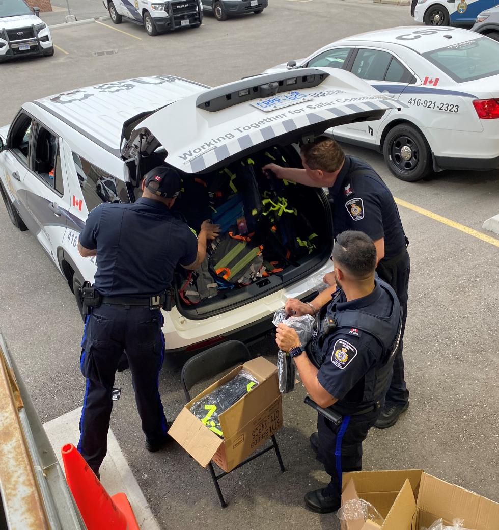 CSU officers loading up a vehicle with donations