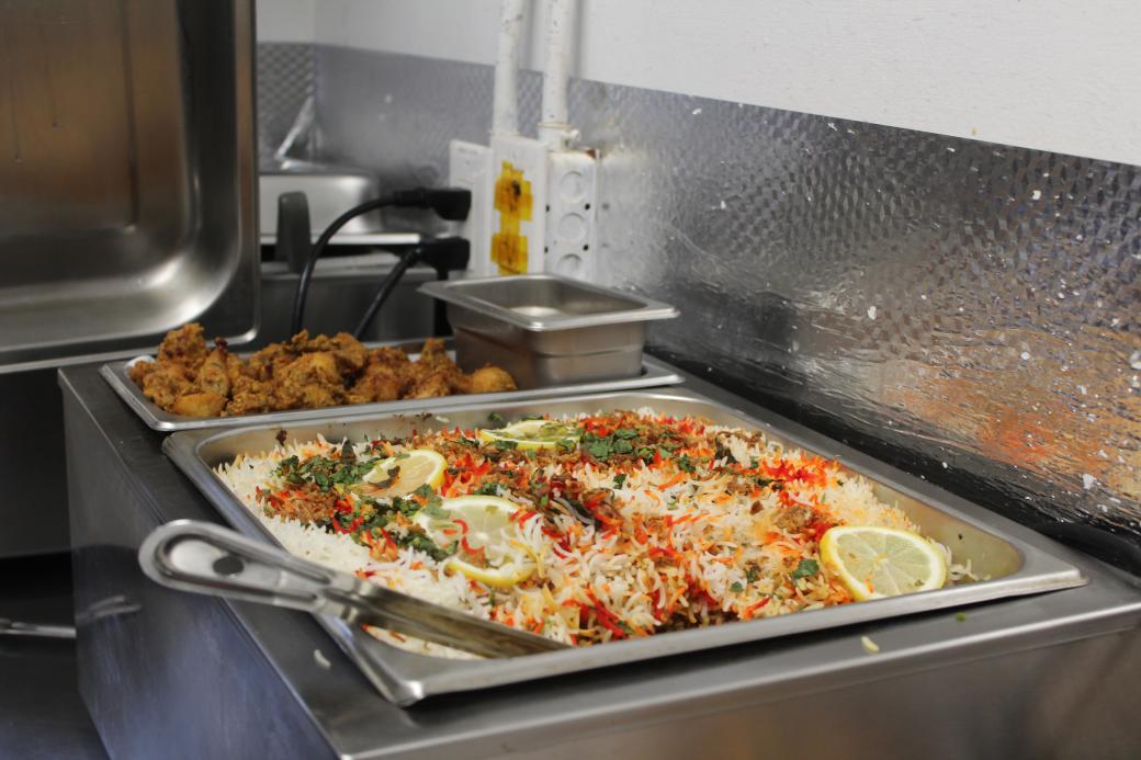 two trays of food at the green cafe