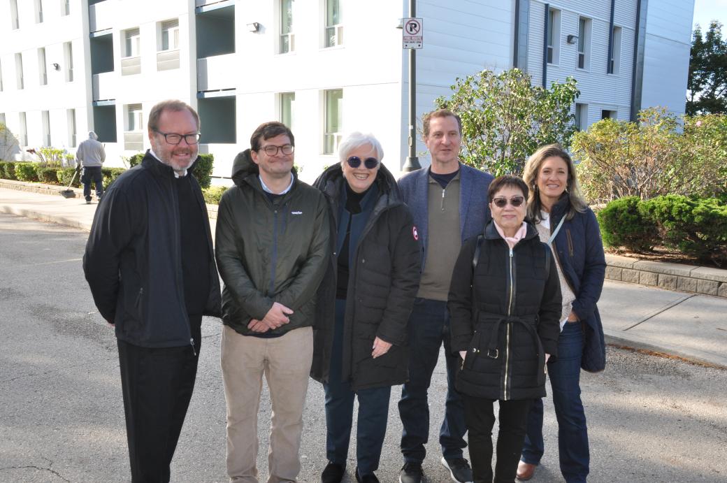 TCHC staff in front of 2 Brahms Avenue in North York