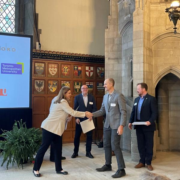 A person receiving a certificate 